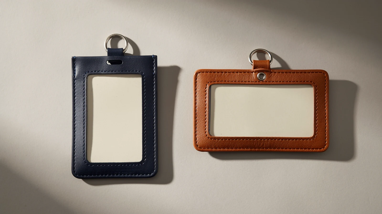 Navy portrait and cognac landscape badge holders with blank display windows